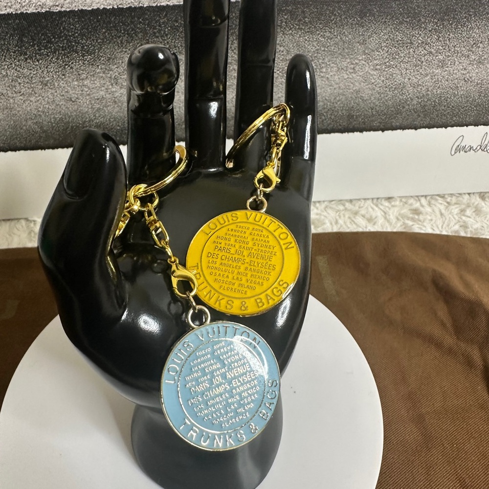 Trunks and Bags Louis Vuitton Yellow and Light Blue Keychains